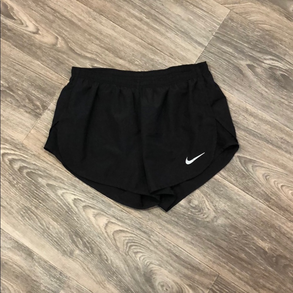 Black Nike running shorts w/ zipper in the back